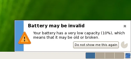 The power manager warning about a worn-out battery.